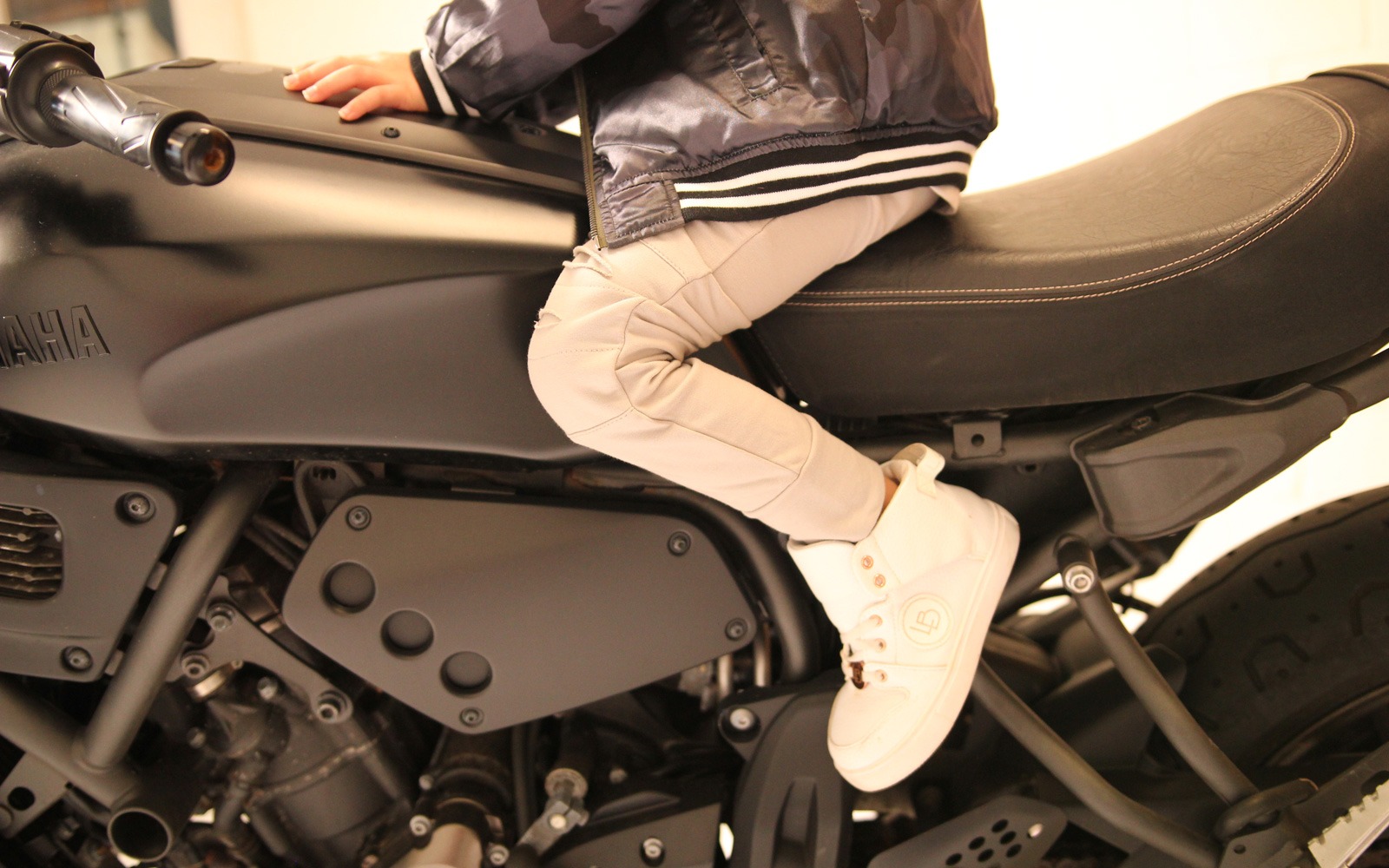 OOVY Pants jacket detail on motorbike