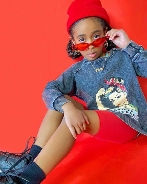 Little Miss Eliana wearing OOVY cateye red sunglasses